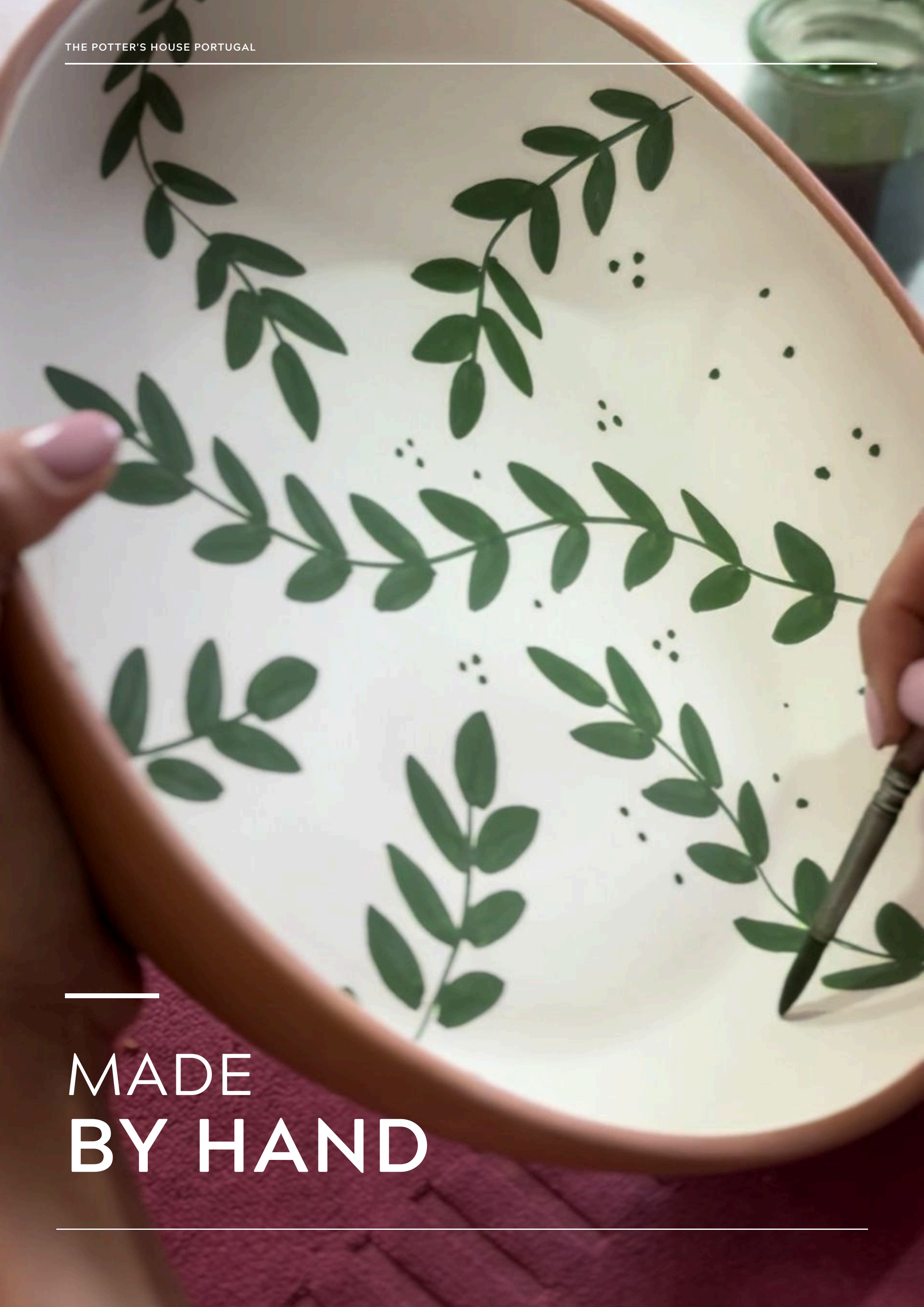 Hands shaping clay on the wheel